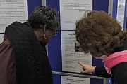 Angela Hilaire and Sheila Campbell spot their quotes in the exhibition